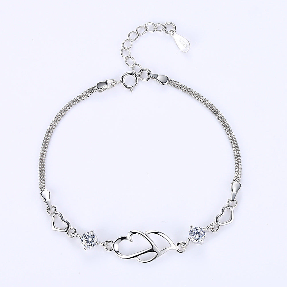Pulseira de Diamantes em Formato de Coração Duplo