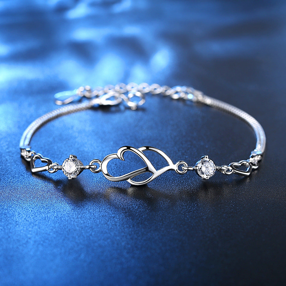 Pulseira de Diamantes em Formato de Coração Duplo
